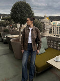 DAXUEN Distressed dark blue flared denim jeans — model photo