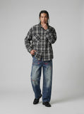DAXUEN Men's wide-leg denim jeans with floral embroidery — model photo