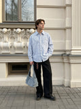 DAXUEN light blue and white vertical pinstripe distressed geometric button-up shirt — model photo