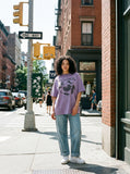 DAXUEN lavender oversized distressed gothic globe graphic t-shirt — model photo
