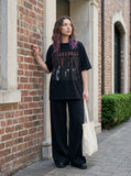 DAXUEN black oversized distressed gothic portrait graphic tee — model photo