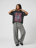 DAXUEN dark grey oversized distressed graffiti graphic t-shirt — model photo