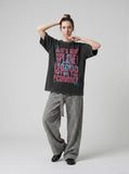DAXUEN dark grey oversized distressed graffiti graphic t-shirt — model photo