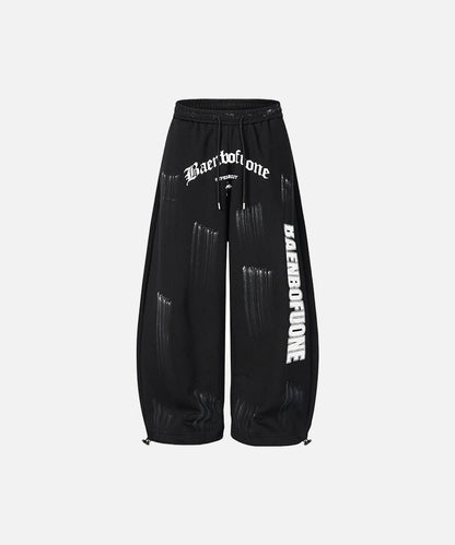DAXUEN Distressed graffiti wide-leg sweatpants