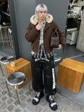 DAXUEN Distressed graffiti wide-leg sweatpants — model photo