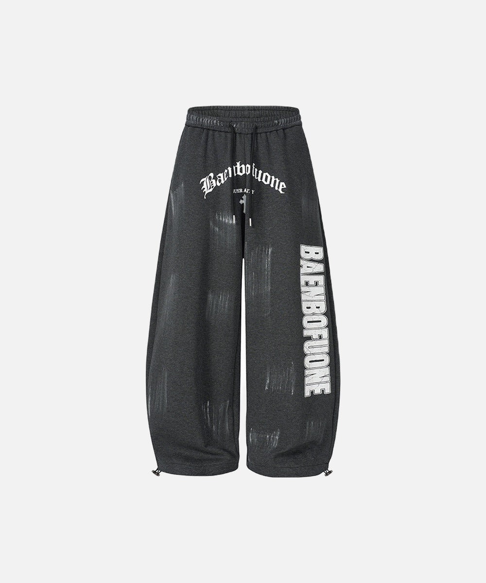 DAXUEN Distressed graffiti wide-leg sweatpants
