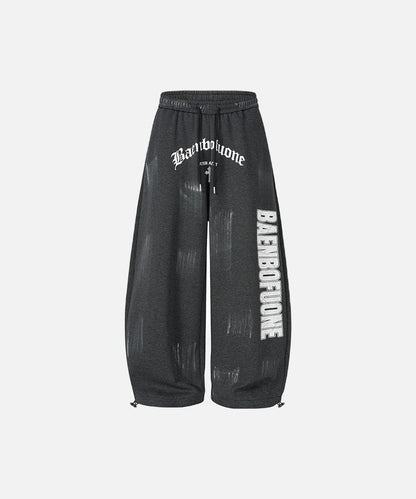 DAXUEN Distressed graffiti wide-leg sweatpants