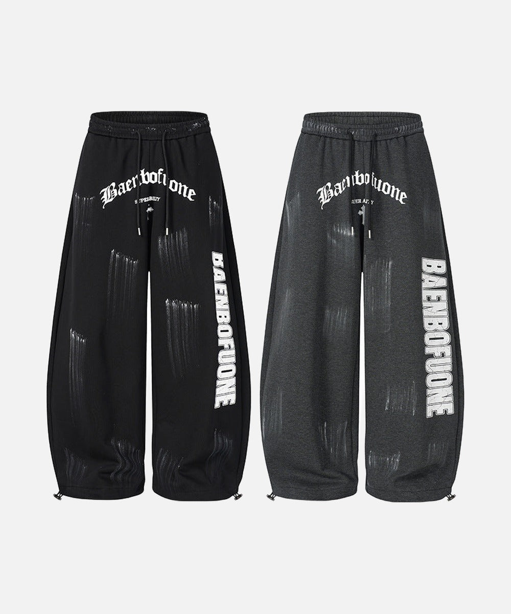 DAXUEN Distressed graffiti wide-leg sweatpants
