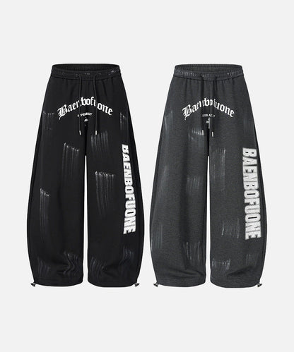 DAXUEN Distressed graffiti wide-leg sweatpants