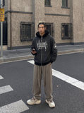 DAXUEN black and grey striped distressed graphic hoodie — model photo