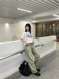 DAXUEN black oversized distressed graphic tee — model photo