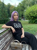 DAXUEN black oversized distressed graphic tee — model photo