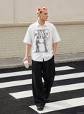 DAXUEN Distressed graphic button-up shirt with short sleeves — model photo