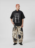 DAXUEN Distressed graphic button-up shirt with short sleeves