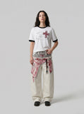 DAXUEN Distressed graphic crewneck T-shirt in white and grey melange — model photo