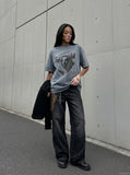 DAXUEN washed blue oversized distressed face graphic t-shirt — model photo