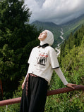 DAXUEN white distressed graphic filmstrip button-up shirt — model photo