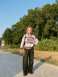 DAXUEN light pink oversized distressed graphic hooded sweatshirt — model photo