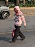 DAXUEN light pink oversized distressed graphic hooded sweatshirt — model photo