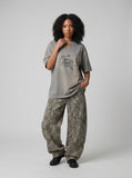 DAXUEN Oversized short-sleeved t-shirt with horse graphic — model photo