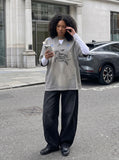 DAXUEN Oversized short-sleeved t-shirt with horse graphic — model photo