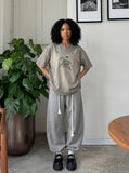 DAXUEN Oversized short-sleeved t-shirt with horse graphic — model photo