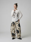 DAXUEN Distressed graphic long sleeve t-shirt — model photo