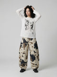 DAXUEN Distressed graphic long sleeve t-shirt — model photo