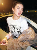 DAXUEN Distressed graphic long sleeve t-shirt — model photo