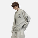 DAXUEN Distressed graphic long sleeve crew neck top