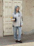 DAXUEN Distressed graphic long sleeve crew neck top
