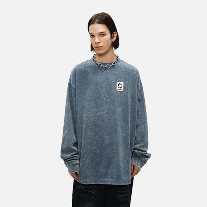 DAXUEN Distressed oversized long sleeve top — model photo