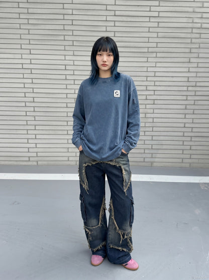 DAXUEN Distressed oversized long sleeve top — model photo