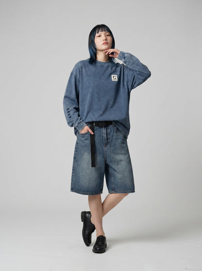 DAXUEN Distressed oversized long sleeve top — model photo