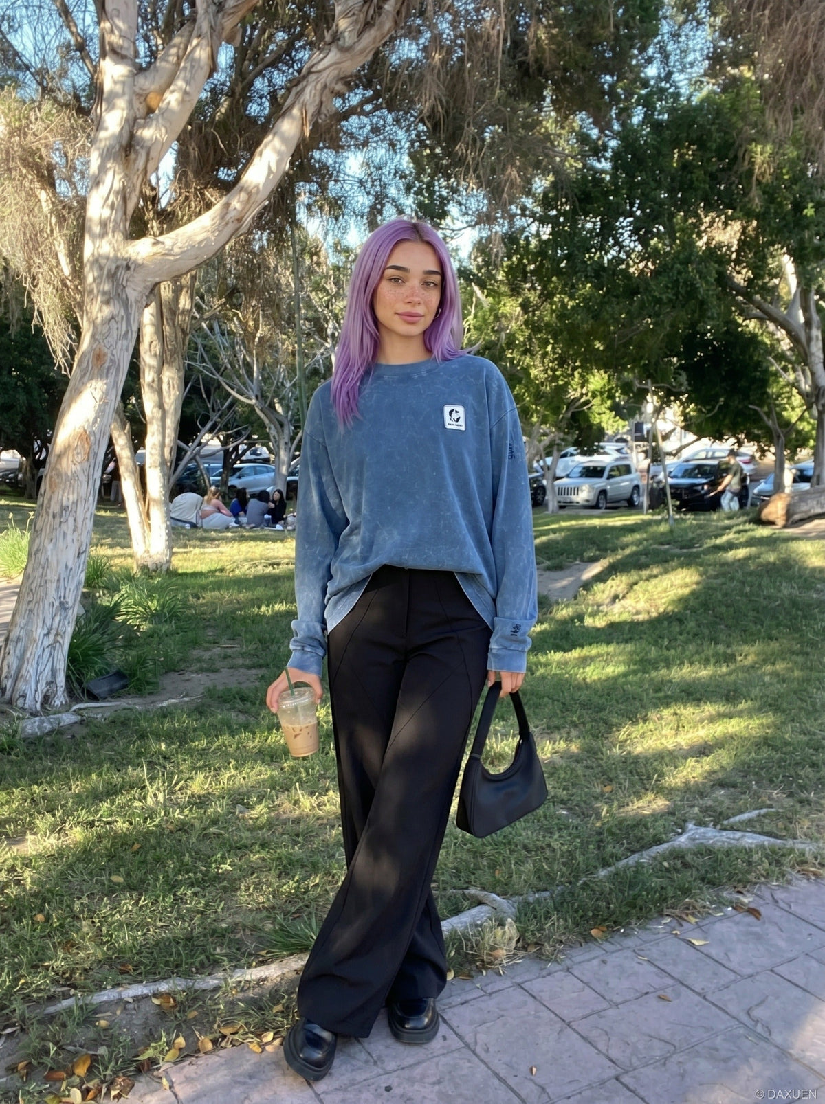 DAXUEN Distressed oversized long sleeve top — model photo