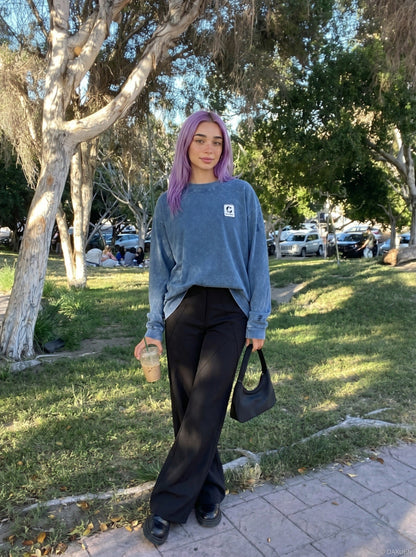 DAXUEN Distressed oversized long sleeve top — model photo