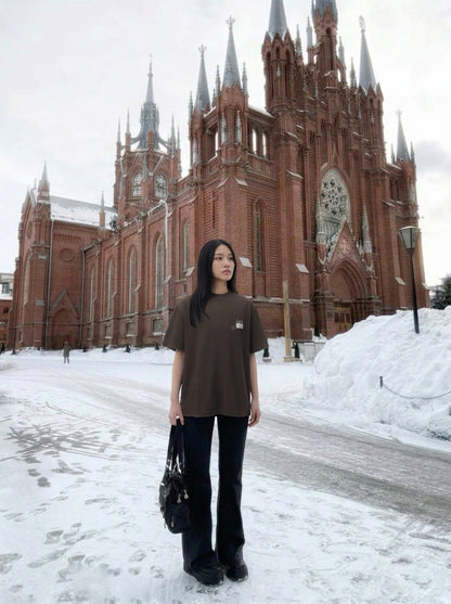 DAXUEN Distressed graphic loose-fit T-shirt — model photo
