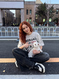 DAXUEN washed grey oversized distressed graphic tee — model photo