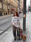 DAXUEN washed grey oversized distressed graphic tee — model photo