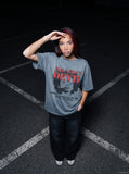 DAXUEN faded blue-grey oversized 'NOT TODAY DEVIL' graphic T-shirt — model photo