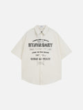 DAXUEN Distressed graphic oversized button-up shirt — model photo