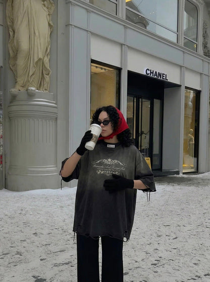 DAXUEN Distressed oversized graphic t-shirt — model photo
