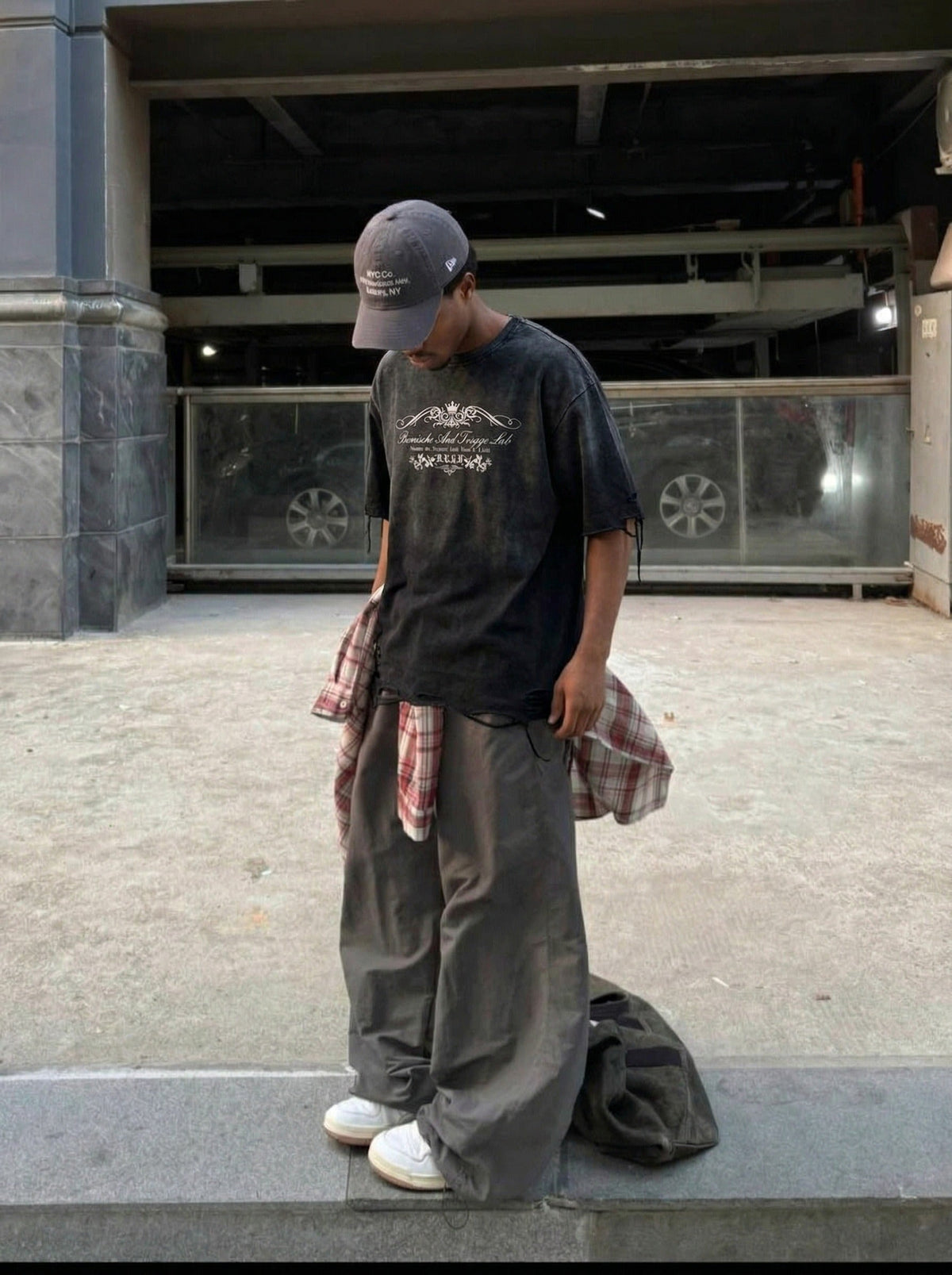 DAXUEN Distressed oversized graphic t-shirt — model photo