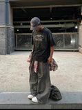 DAXUEN Distressed oversized graphic t-shirt — model photo