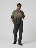 DAXUEN Distressed oversized graphic t-shirt — model photo