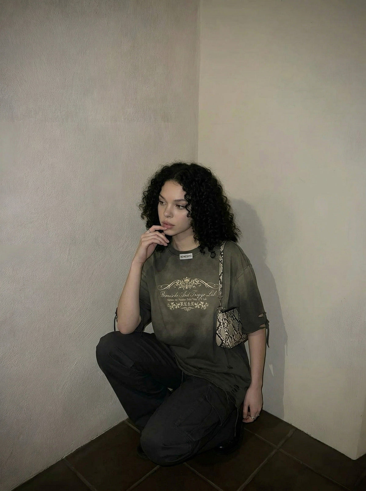 DAXUEN Distressed oversized graphic t-shirt — model photo