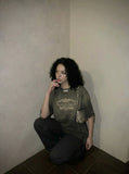 DAXUEN Distressed oversized graphic t-shirt — model photo