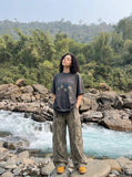 DAXUEN Distressed graphic oversized short-sleeved T-shirt — model photo