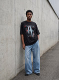 DAXUEN black oversized distressed graphic person t-shirt — model photo