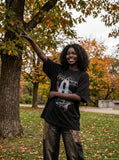DAXUEN black oversized distressed graphic person t-shirt — model photo